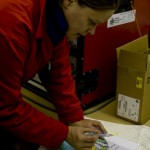 Dr Carol Cotterill reviews the charts and prepares a marine geophysical survey line plan.